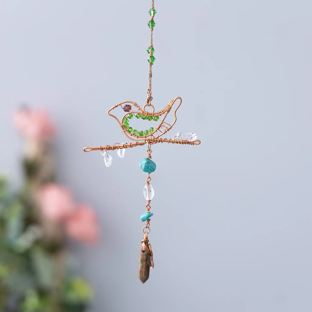 Decorative hanging bird ornament with beads and stones on a blurred background boho home decor, crystal wind chime, sun catcher for windows, moon prism chime, agate stone hanging, garden art decor, patio hanging decoration, boho housewarming gift, spiritual gift, crystal suncatcher, balcony decor, meditation decor, handmade crystal chime