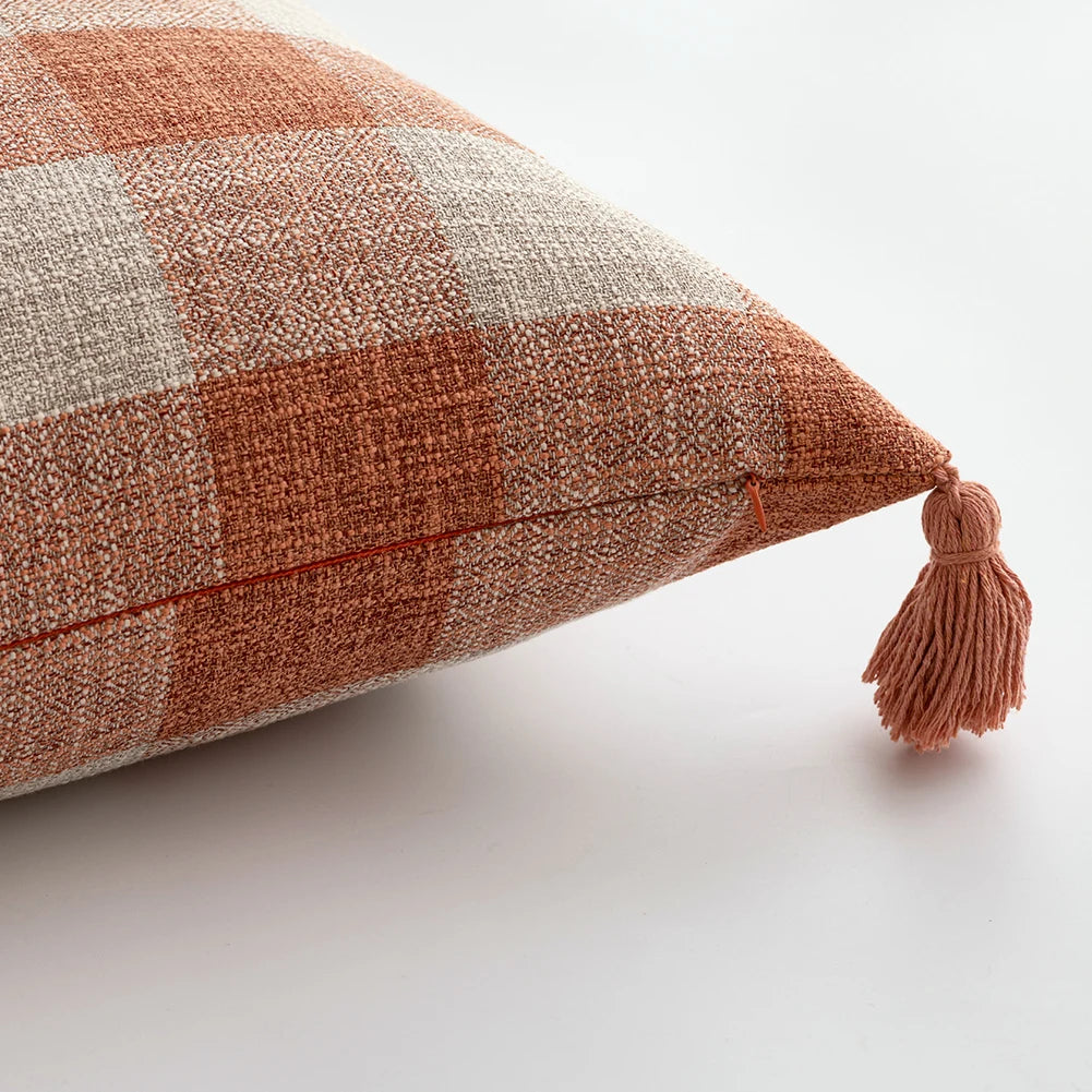 Orange linen tassels cushion cover styled on modern sofa, decorative boho throw pillow for living room, bed, or chair, perfect for cozy home vibes and housewarming gift ideas. Square and Rectangle.