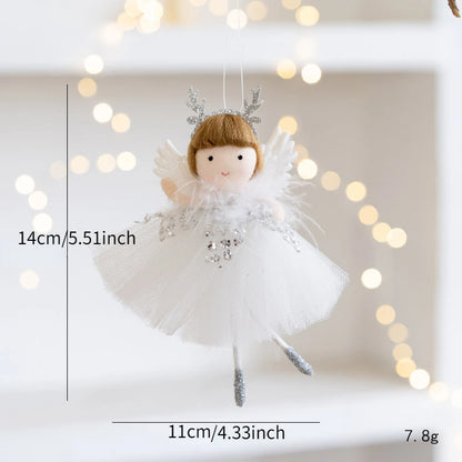 White angel figurine Christmas Ornament with measurements against a blurred light background