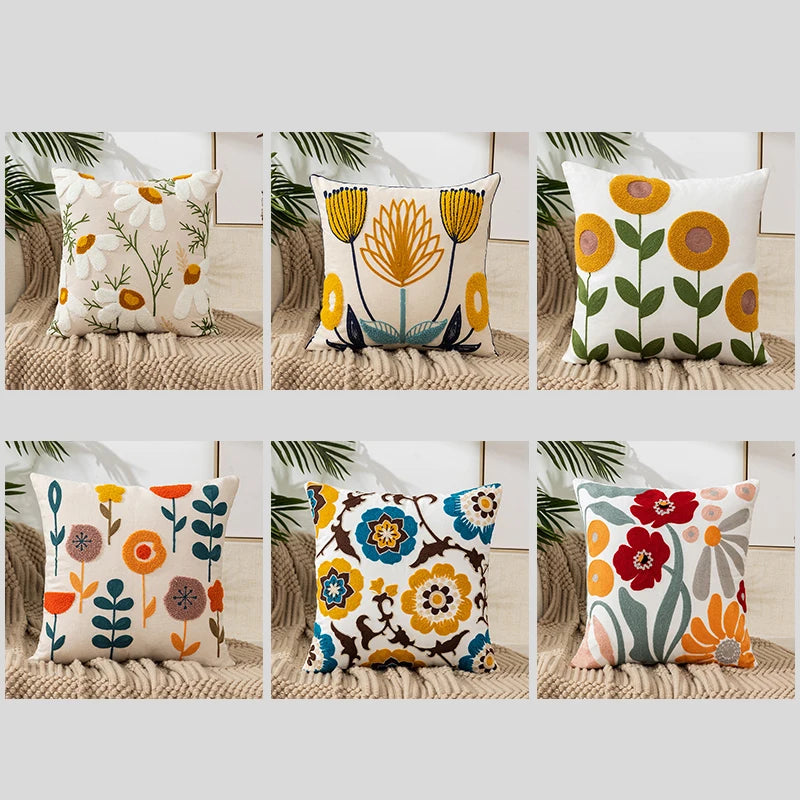 Vintage floral embroidered pillowcase styled on a sofa, boho throw cushion cover adds texture and charm to bohemian home decor, perfect for cozy living room decor, eclectic home styling, and unique boho gifts under $50