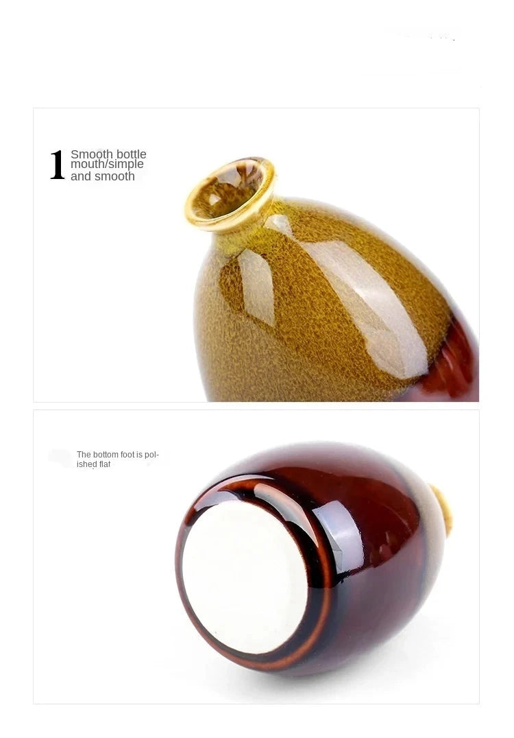Glass bottle with gold cap on a white background