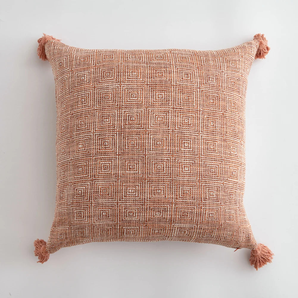 Orange linen tassels cushion cover styled on modern sofa, decorative boho throw pillow for living room, bed, or chair, perfect for cozy home vibes and housewarming gift ideas. Square and Rectangle.