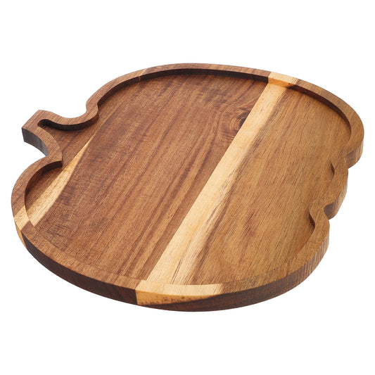Wooden cutting board with a curved edge on a white background. Rustic wooden pumpkin serving platter with natural grain, charcuterie board for Thanksgiving snacks, Halloween desserts, and fall entertaining