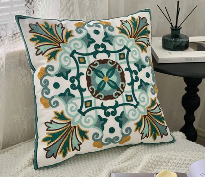 Decorative pillow with intricate patterns on a couch, floral embroidery on linen cotton cushion cover – boho home decor accent