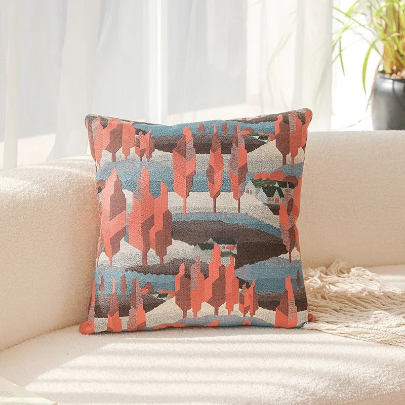 Decorative pillow with a colorful pattern on a couch. Modern yarn-dyed throw pillow cover, luxury textured decorative cushion for sofa, bed, or window seating in soft neutral tones.