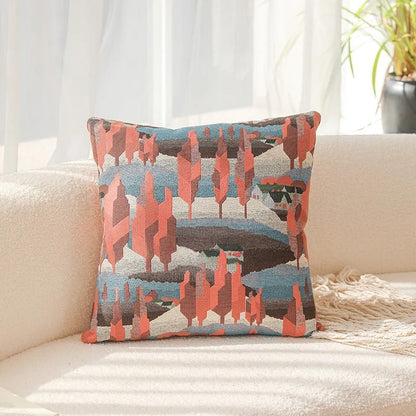 Decorative pillow with a colorful pattern on a couch. Modern yarn-dyed throw pillow cover, luxury textured decorative cushion for sofa, bed, or window seating in soft neutral tones.