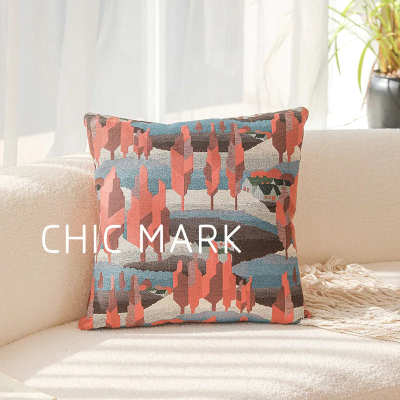 Decorative pillow with a colorful pattern on a couch, featuring the brand 'Chic Mark'.Modern yarn-dyed throw pillow cover, luxury textured decorative cushion for sofa, bed, or window seating in soft neutral tones.