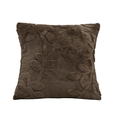 Brown decorative pillow with leaf patterns on a white background. Modern jacquard leaf throw pillow cover, woven floral decorative cushion for sofa, bed, or living room in neutral and soft tones.