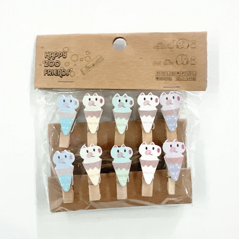 Set of cute ice cream-shaped clothespins in packaging with 'Happy Zoo Friends' branding.
