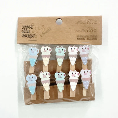 Set of cute ice cream-shaped clothespins in packaging with 'Happy Zoo Friends' branding.