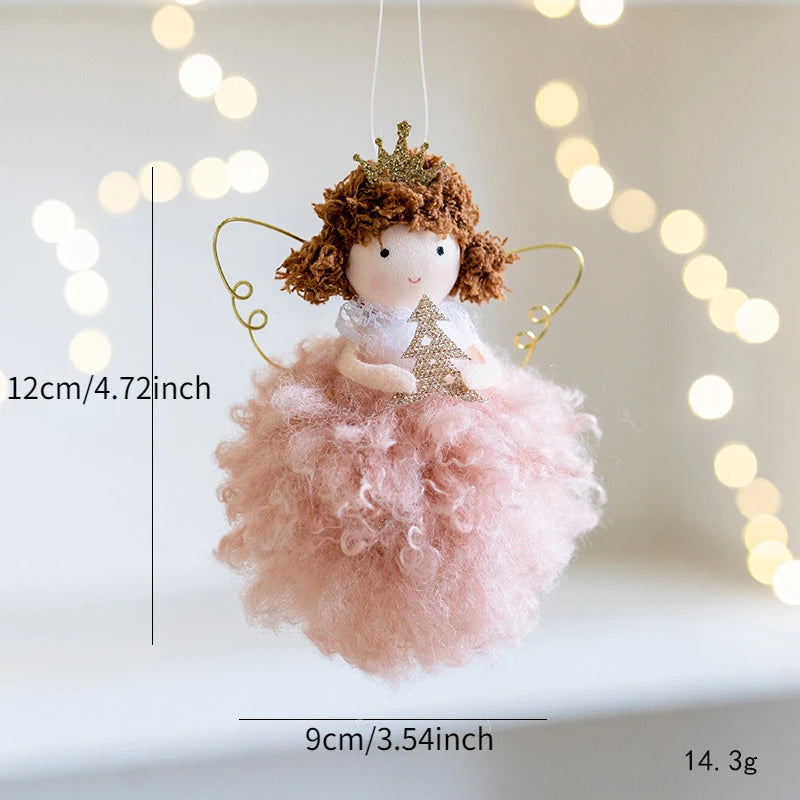 Small angel figurine Christmas Ornament with measurements on a light background