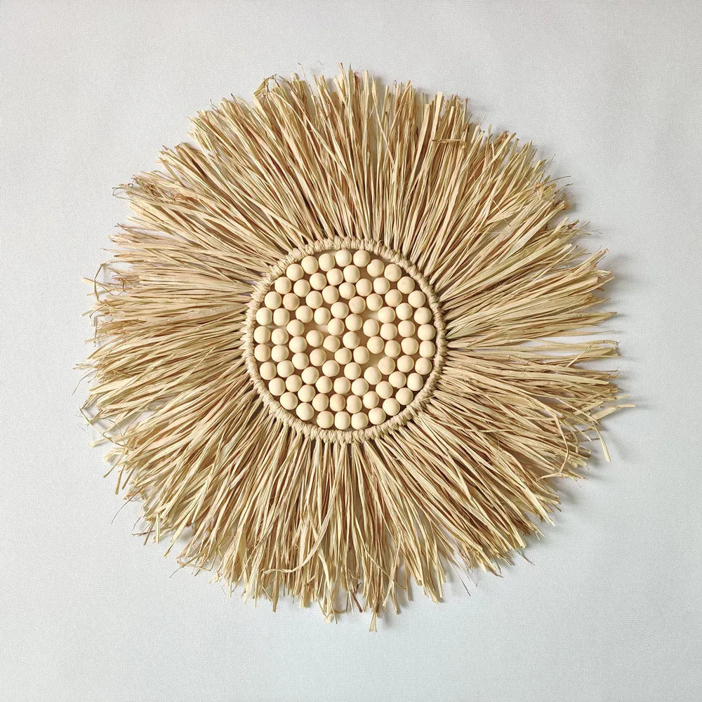 Round woven mat with beaded center on a light gray background boho home decor, boho wall mirror, macrame wall mirror, nordic decor, romantic wedding wall decoration, housewarming gift, round straw mirror, woven wall decor, tapestry mirror, boho bedroom wall accent, rustic mirror wall hanging