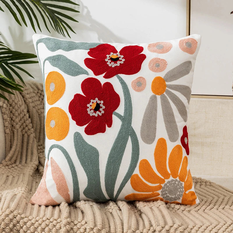 Vintage floral embroidered Poppies pillowcase styled on a sofa, boho throw cushion cover adds texture and charm to bohemian home decor, perfect for cozy living room decor, eclectic home styling, and unique boho gifts under $50
