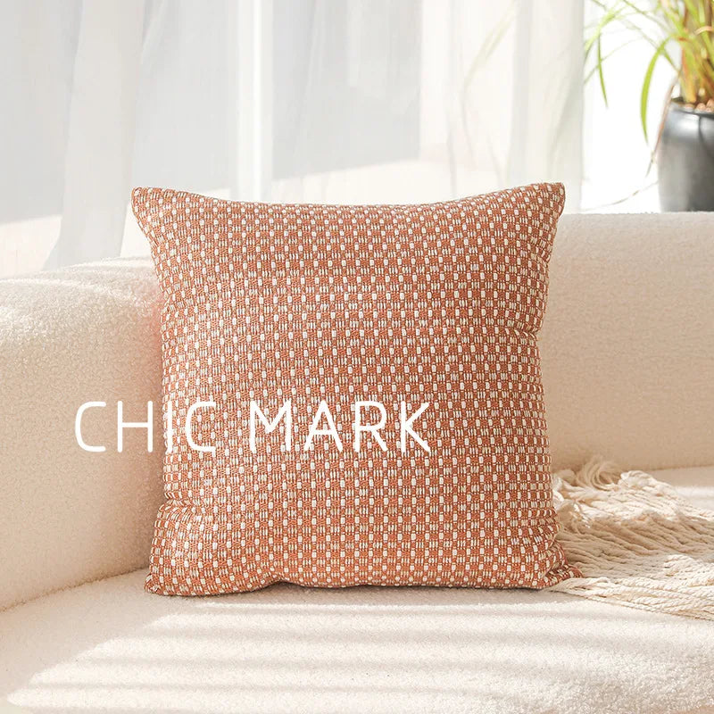 Decorative pillow with 'CHIC MARK' branding on a beige couch. Modern yarn-dyed throw pillow cover, luxury textured decorative cushion for sofa, bed, or window seating in soft neutral tones.