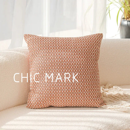 Decorative pillow with 'CHIC MARK' branding on a beige couch. Modern yarn-dyed throw pillow cover, luxury textured decorative cushion for sofa, bed, or window seating in soft neutral tones.