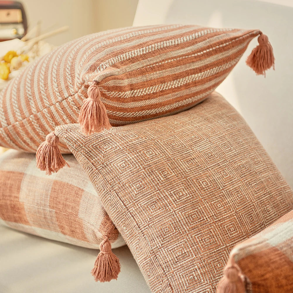 Orange linen tassels cushion cover styled on modern sofa, decorative boho throw pillow for living room, bed, or chair, perfect for cozy home vibes and housewarming gift ideas. Square and Rectangle.