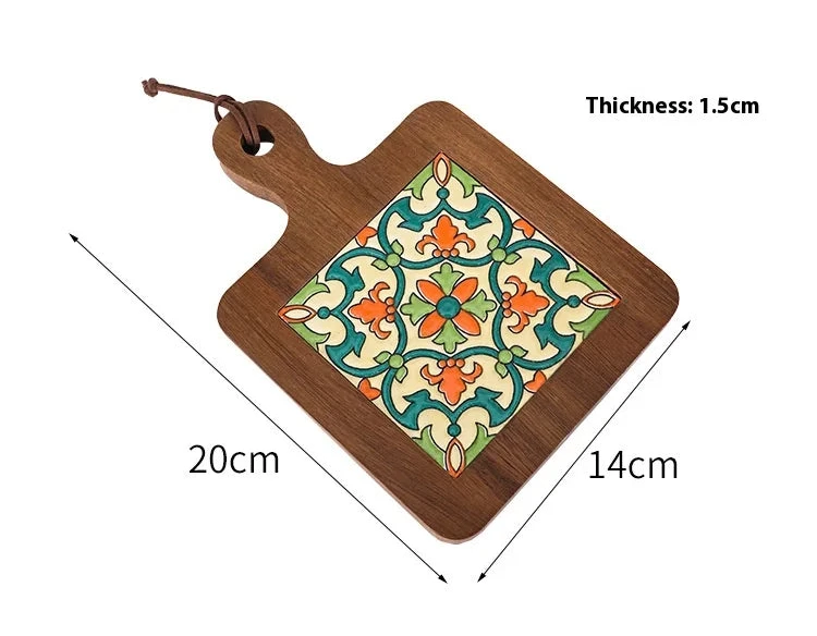 Wooden cutting board with decorative tile design and product parameters on a white background