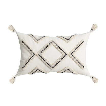 Decorative pillow with geometric pattern and tassels on a white background Nordic blue tufted cushion cover with geometric stripe and grid crochet pattern, tassel pillow cover for sofa, bed, and boho home decor