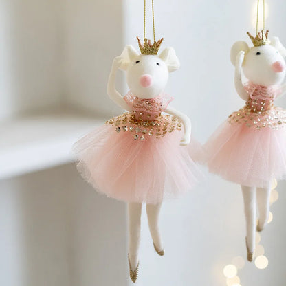 Two decorative mouse ornaments in pink tutus with gold crowns on a white background.