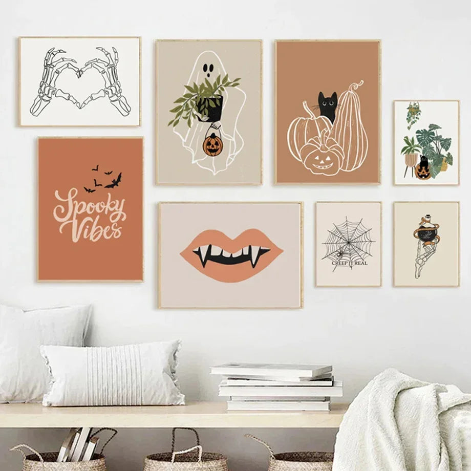 Set of Halloween-themed wall art prints on a wall with a bench and decor items below.