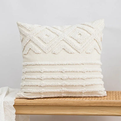 Textured white pillow on a wooden surface with a light gray background Nordic blue tufted cushion cover with geometric stripe and grid crochet pattern, tassel pillow cover for sofa, bed, and boho home decor