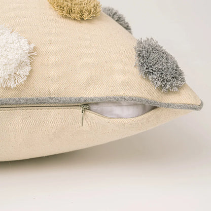 Beige pillow with colorful pom-poms on a light background. Boho cushion cover for sofa, bed, or chair 18x18 inch
