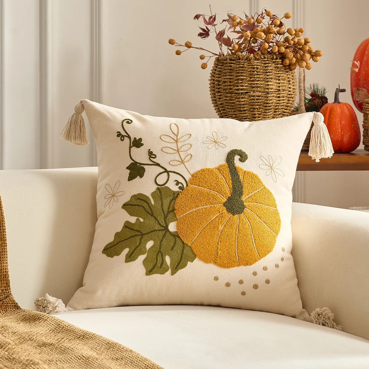 Decorative pillow with pumpkin design on a couch. Halloween and Thanksgiving decorative pillow cover For Fall