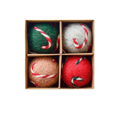 Four colorful felt wool Christmas balls in a wooden box with text indicating their diameter.