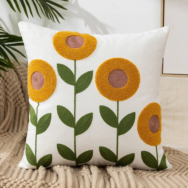 Vintage floral embroidered Sunflower pillowcase styled on a sofa, boho throw cushion cover adds texture and charm to bohemian home decor, perfect for cozy living room decor, eclectic home styling, and unique boho gifts under $50
