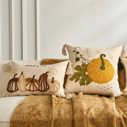 Decorative pillows with pumpkin designs on a couch. Halloween and Thanksgiving decorative pillow cover For Fall