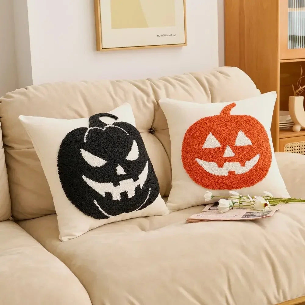 Two Halloween-themed pillows on a beige couch with a neutral background. Cartoon pumpkin cushion cover for kids’ room, fall and Halloween decorations