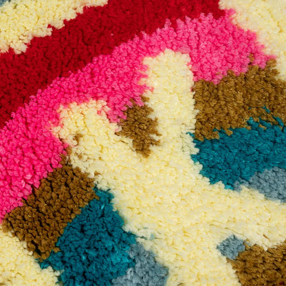 Close-up of a colorful textured surface with pink, red, blue, and brown patterns. boho home decor, bathroom rug, tufted bath mat, Get Naked rug, colorful shower mat, apartment decor, dorm bathroom accessories, housewarming gift, microfiber bath mat, fun bathroom rug, American style bath mat
