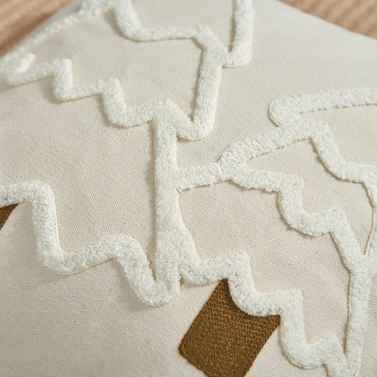 Close-up of a textured fabric with wavy white border on a beige background. tufted Christmas pillow cover with tassels, decorative festive cushion case for sofa or bed in 12x20 or 18x18 inches