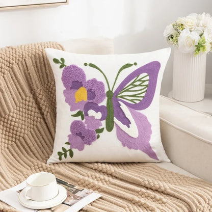 Decorative pillow with butterfly and flower design on a couch Embroidered flower pillow cover, 17.7-inch square canvas cushion case with floral design for sofa, bed, and boho home decor