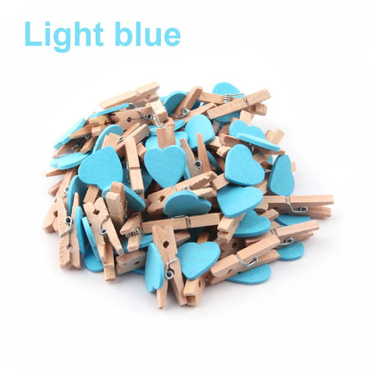 Light blue heart-shaped clips on a white background