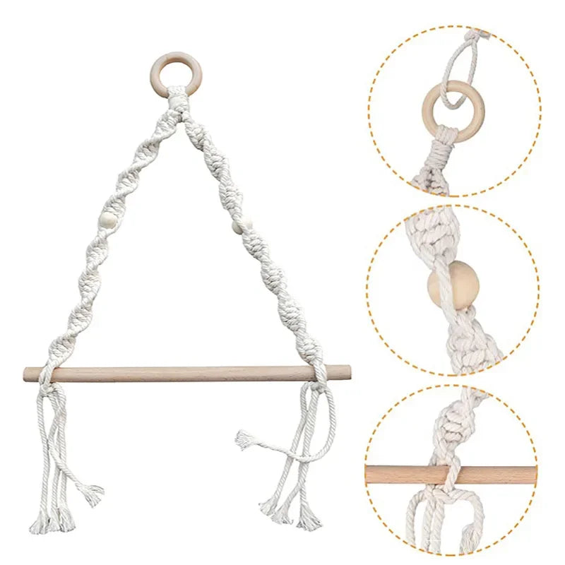 White macrame baby swing with wooden rod and rings on a white background boho home decor, toilet paper holder, bohemian bathroom accessory, tissue holder, wall-mounted towel rack, cotton rope toilet paper rack, wooden bead towel holder, rustic home decor, boho wall decor, bathroom organization, housewarming gift