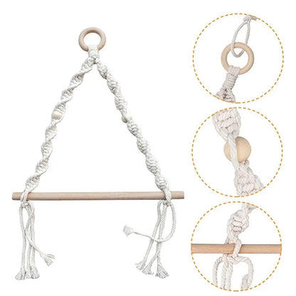 White macrame baby swing with wooden rod and rings on a white background boho home decor, toilet paper holder, bohemian bathroom accessory, tissue holder, wall-mounted towel rack, cotton rope toilet paper rack, wooden bead towel holder, rustic home decor, boho wall decor, bathroom organization, housewarming gift