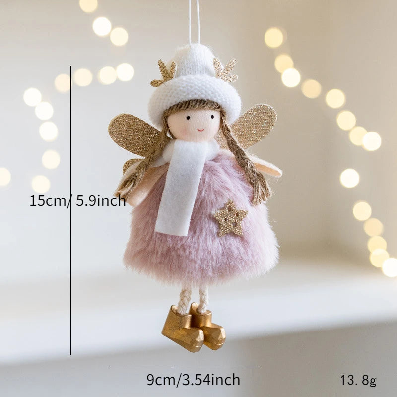 Small fairy doll Christmas Ornament with measurements and a blurred light background