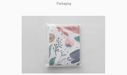 Floral-patterned packaging on a gray background. Deer forest jacquard woven blanket with floral and woodland tapestry design – boho throw for sofa or bed, soft cotton blend decorative bedspread for cozy home décor.