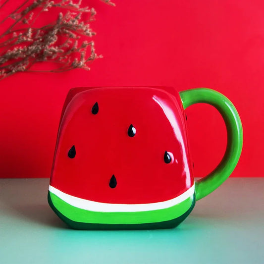 Watermelon-shaped mug with a green handle on a red background Creative watermelon ceramic mug, kawaii coffee and milk cup with hand-painted design, 500ml porcelain drinkware for kitchen decor