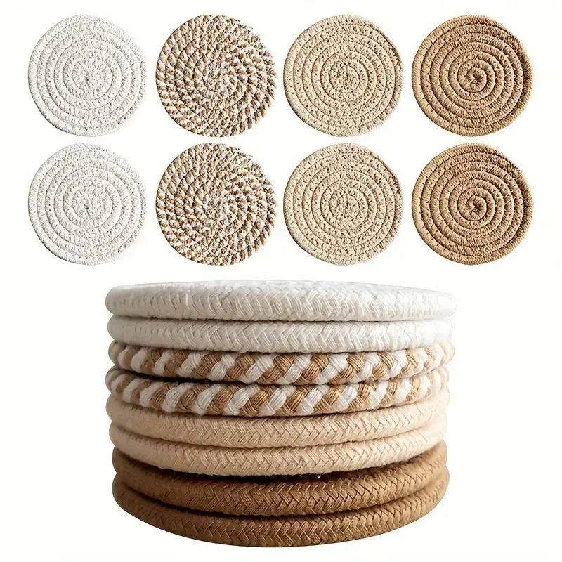 Set of round woven coasters in various colors stacked and arranged on a white background. Stacked cotton coasters in cozy prairie chic style – boho-inspired drink mats
