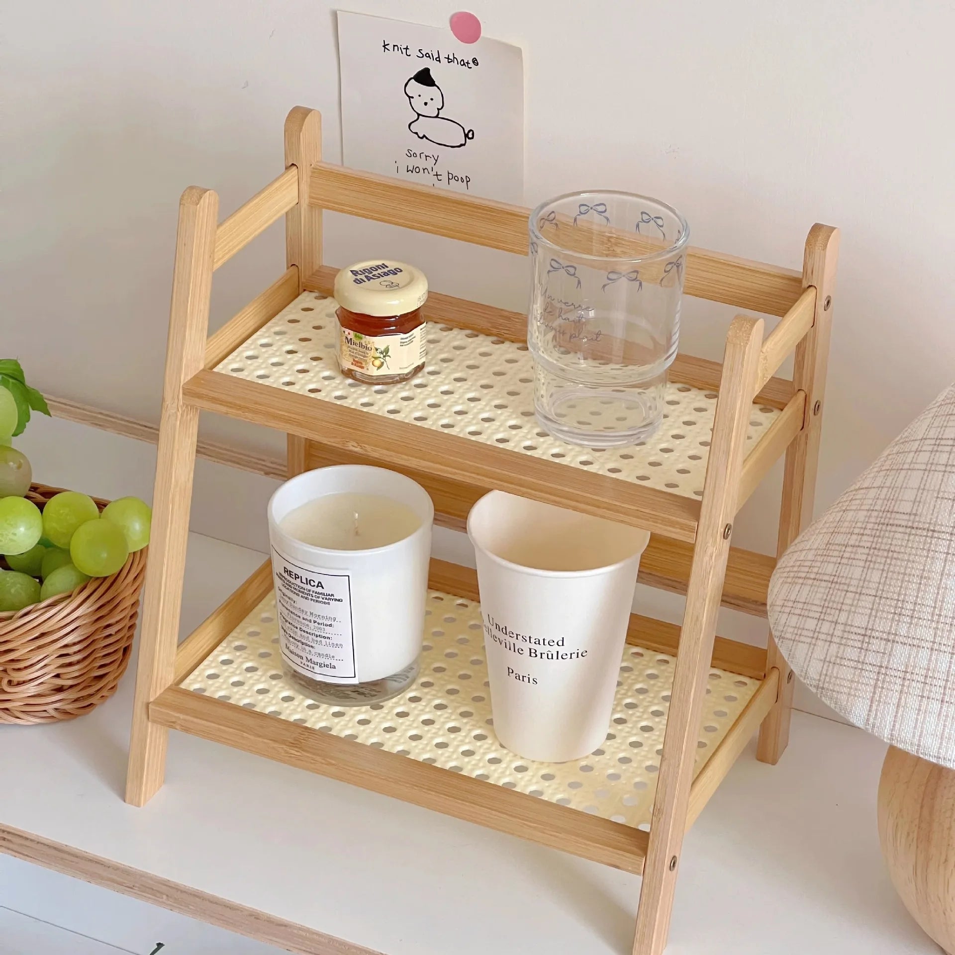 Wooden shelf with decorative items on a white surface 2-tier bamboo countertop organizer shelf in walnut and blonde finish, multipurpose coffee cup holder and storage rack for kitchen, bathroom, or vanity