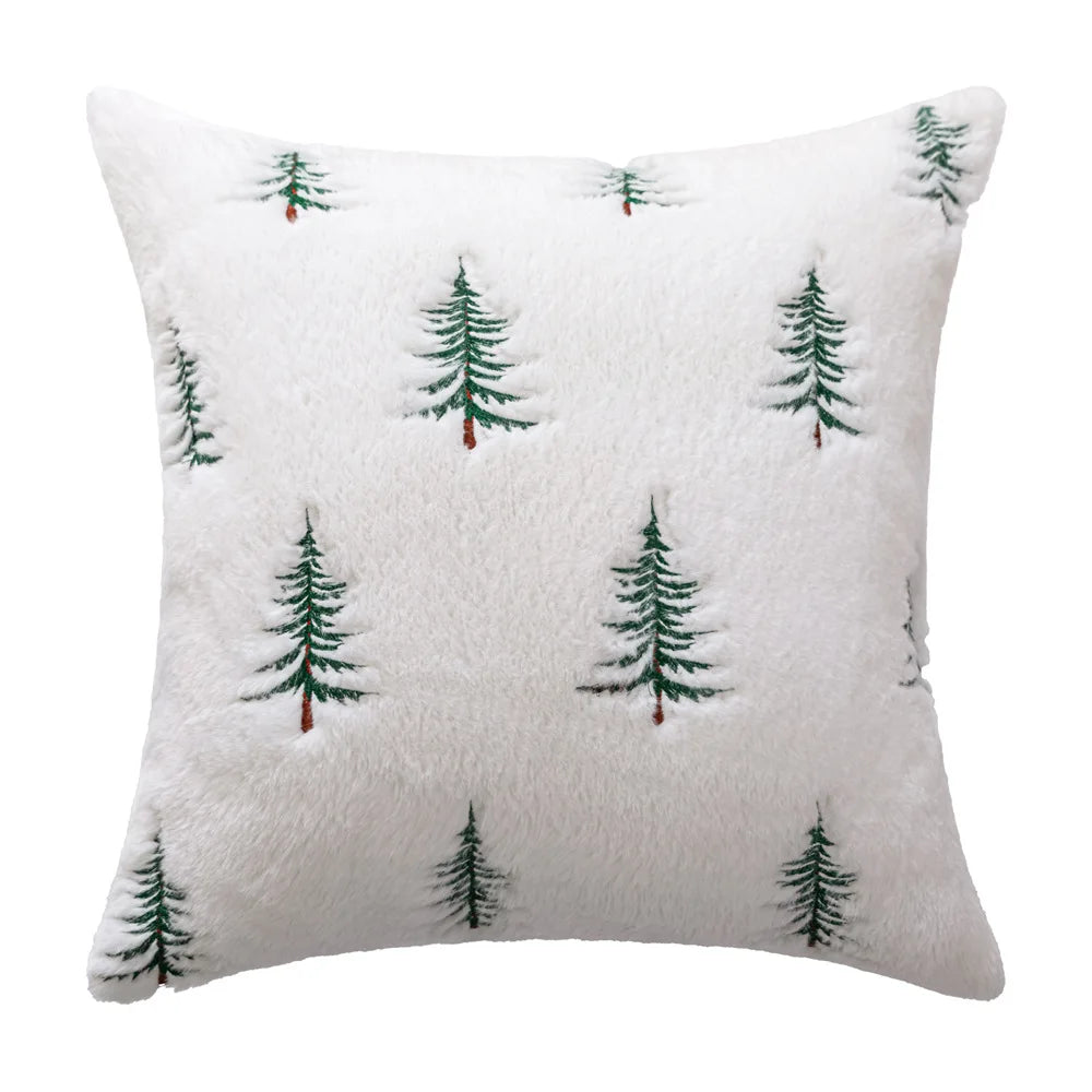 Decorative pillow with pine tree pattern on a white background