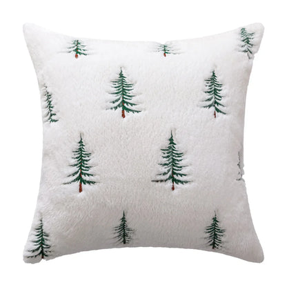 Decorative pillow with pine tree pattern on a white background