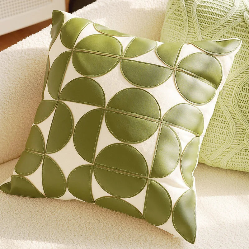 Decorative pillow with green leaf pattern on a beige couch boho home decor, housewarming gift, embroidered pillow cover, flying bird cushion, animal pattern pillowcase, decorative throw pillow, Nordic cushion cover, luxury boho accent, sofa decor, nature-inspired pillow, canvas cushion case, textured home accessories