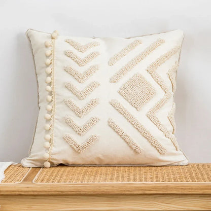 Decorative pillow with geometric pattern on a wooden surface against a light background Nordic blue tufted cushion cover with geometric stripe and grid crochet pattern, tassel pillow cover for sofa, bed, and boho home decor