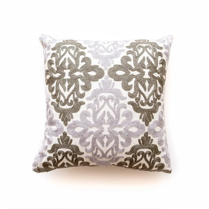 Decorative pillow with gray floral pattern on a white background