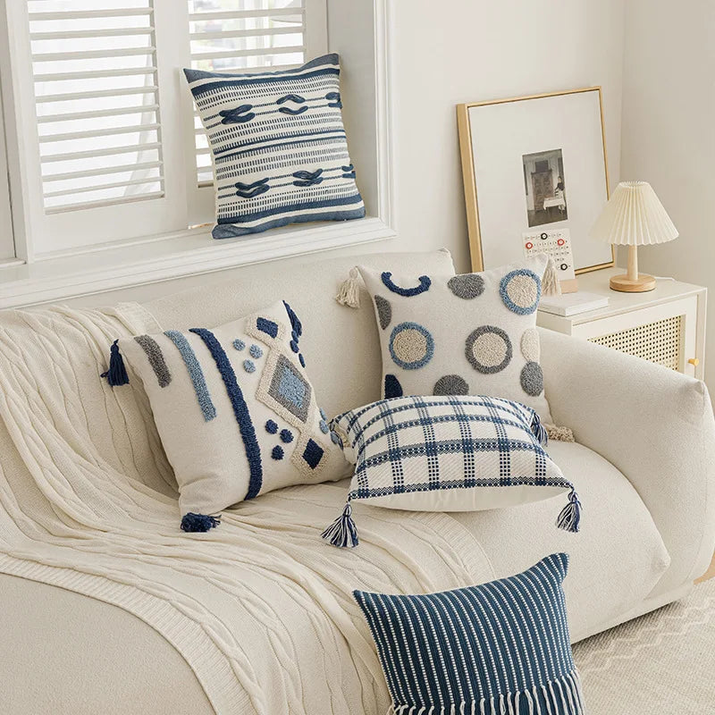 Decorative pillows on a sofa with a neutral color scheme Nordic blue tufted cushion cover with geometric stripe and grid crochet pattern, tassel pillow cover for sofa, bed, and boho home decor