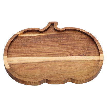 Wooden cutting board shaped like a pumpkin on a white background. Rustic wooden pumpkin serving platter with natural grain, charcuterie board for Thanksgiving snacks, Halloween desserts, and fall entertaining