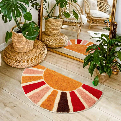 Colorful sun-shaped rug on a wooden floor with plants and a mirror. boho home decor, sunflower door mat, half circle rug, plush entry mat, non-slip bath mat, boho floor mat, floral floor rug, bathroom rug, farmhouse decor, cozy home gift, housewarming gift, living room mat, pastel home accents, cute doormat